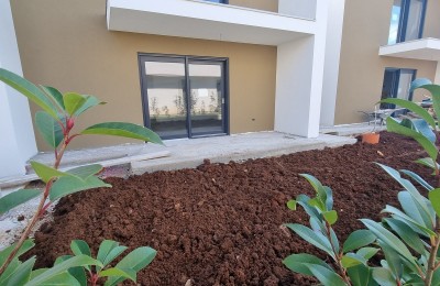 NEW BUILDING !!! Ground floor apartment with garden, 2 km from the sea - under construction 24