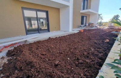 NEW BUILDING !!! Ground floor apartment with garden, 2 km from the sea - under construction 25